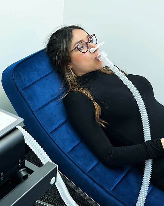 A customer participating in an Resting Metabolic Rate test